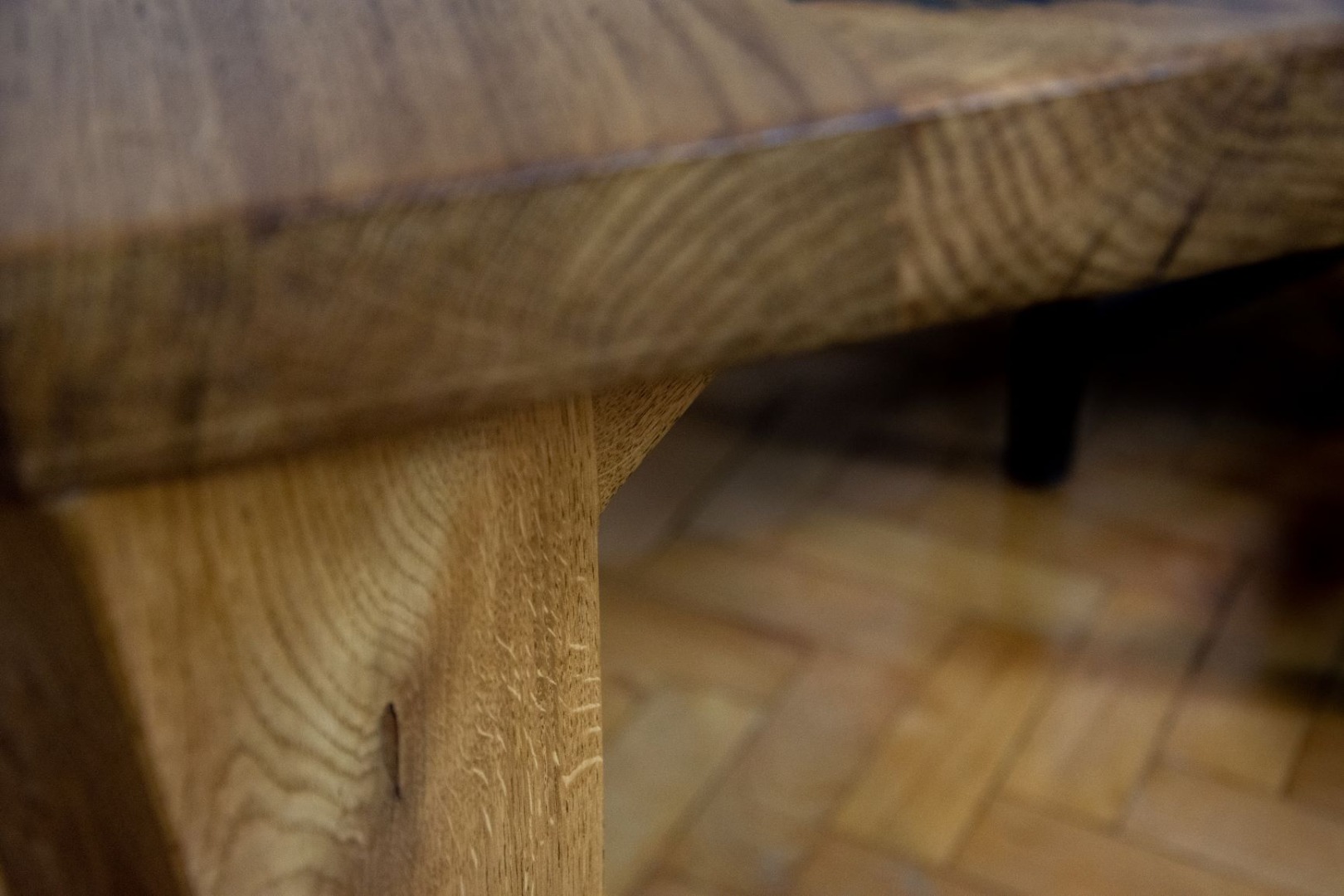 Rustic oak dining table with visible grain